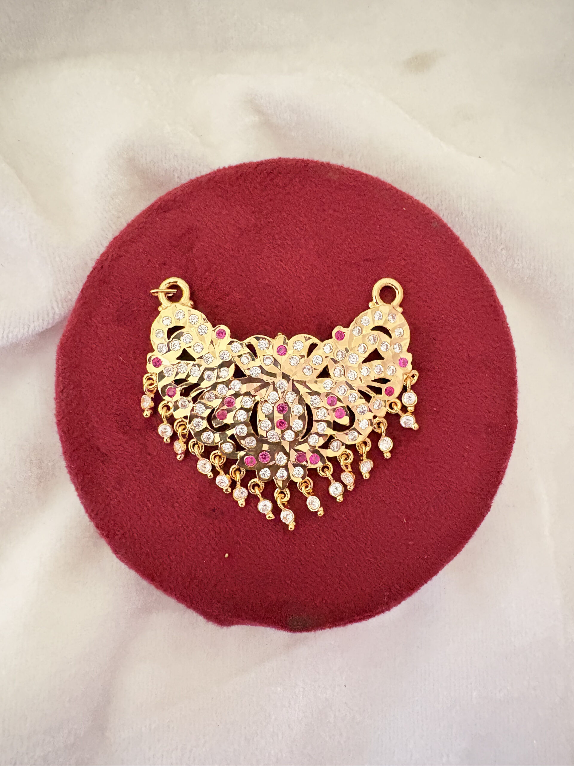 Radiant Victory Charm – 118 Stone Pendant